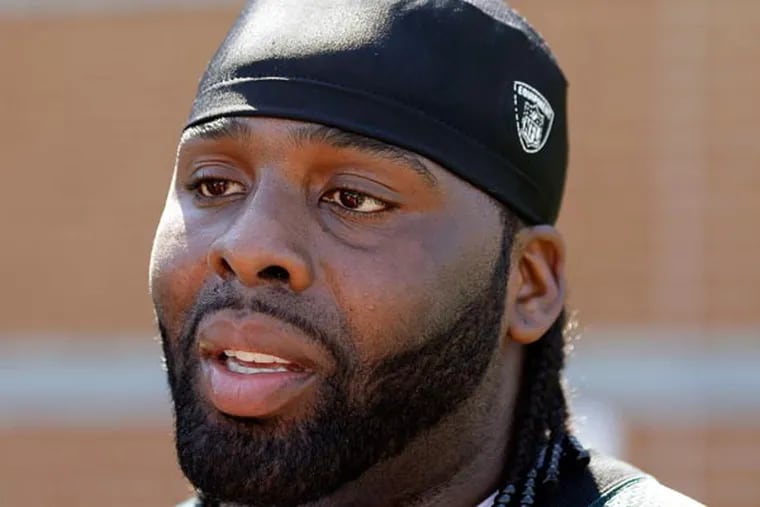 Jason Peters speaks with members of the media after NFL football practice at the team's training facility, Tuesday, June 4, 2013, in Philadelphia. (Matt Rourke/AP)
