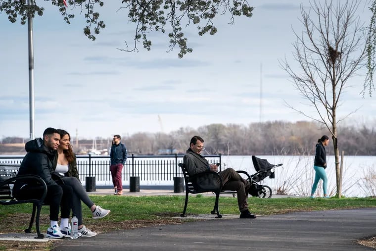 Park goers at Penn Treaty Park engage in social distancing from others, in Philadelphia, March 24, 2020.