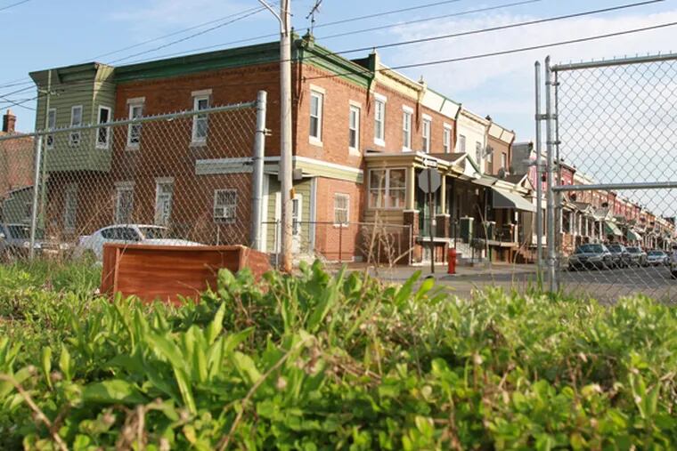The large vacant lot at 1801 West Courtland St. is shown in the foreground with the homes on Gratz Street in the background on April 25, 2014. (CHARLES FOX/Staff Photographer)