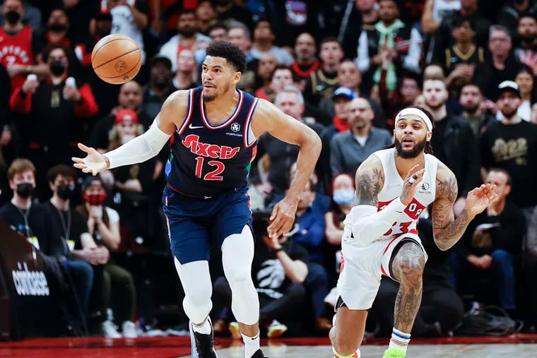 Sixers forward Tobias Harris steals the basketball from Toronto Raptors guard Gary Trent Jr., during game three of the first-round Eastern Conference playoffs on Wednesday, April 20, 2022 in Toronto.