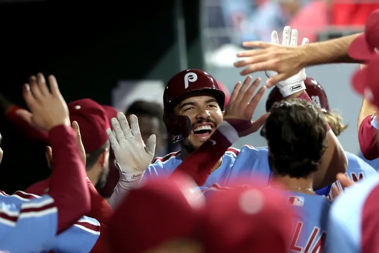 Darick Hall of the Phillies is congratulated by his teammates after his 2nd home run.  Hall had his first 2 major league hits, both home runs, against the Braves on June 30, 2022.