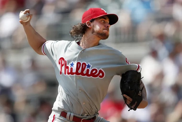 Phillies starter Aaron Nola works in the first inning against the Atlanta Braves. It may have been his last start of the season.