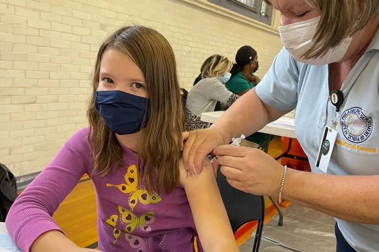 The author's daughter got her first dose of the COVID-19 vaccine on the first day the city began offering the vaccine to kids aged 5-11.