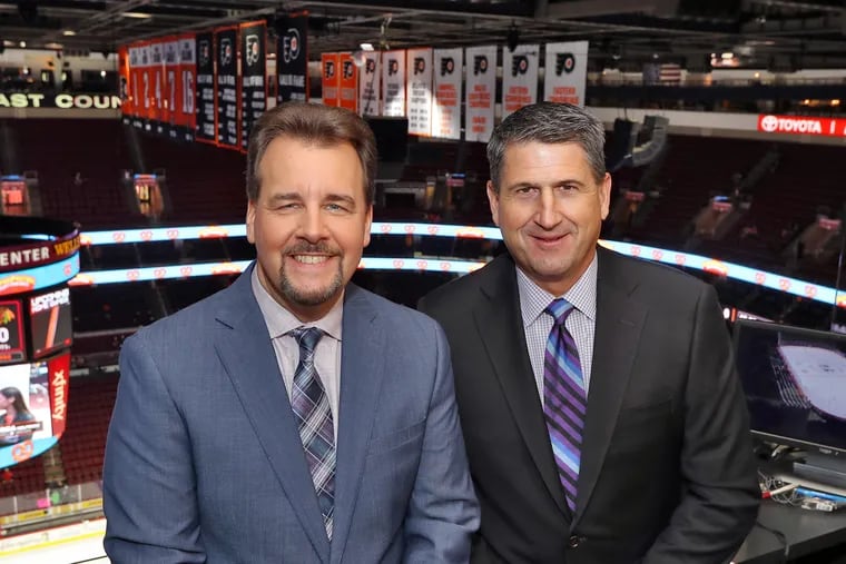 Jim Jackson, shown here on the left, with Keith Jones, will continue in his role as the Flyers' TV play-by-play announcer.