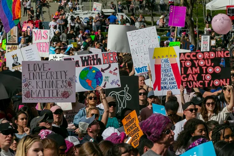 Thousands gathered in cities across the country Saturday as part of the nationwide Women's March rallies focused on issues such as climate change, pay equity, reproductive rights and immigration.