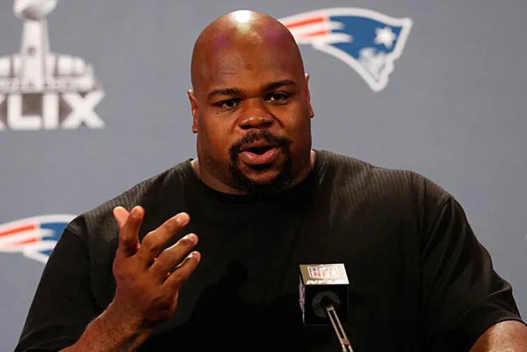 New England Patriots defensive tackle Vince Wilfork answers questions during a press conference at Chandler Wild Horse Pass. (Matthew Emmons/USA Today)