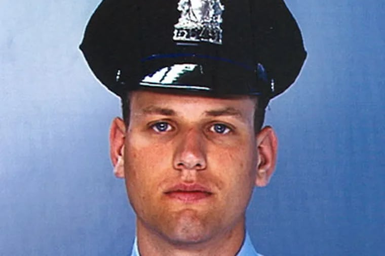 Philadelphia police Officer John Pawlowski, 25, was shot and killed Friday night while responding to a fight between a cab driver and a man along Broad Street in front of the Olney Transportation Center. (Police handout photo)