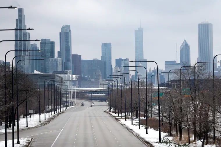 Chicago's Lake Shore Drive is barren of its usual vehicle traffic, Monday, March 23, 2020. The coronavirus pandemic could test a generation in ways they have never faced. One expert likens the impact to that of the Great Depression. As they're being asked to study at home and distance socially to help their more vulnerable elders, how will they cope? (AP Photo/Charles Rex Arbogast)