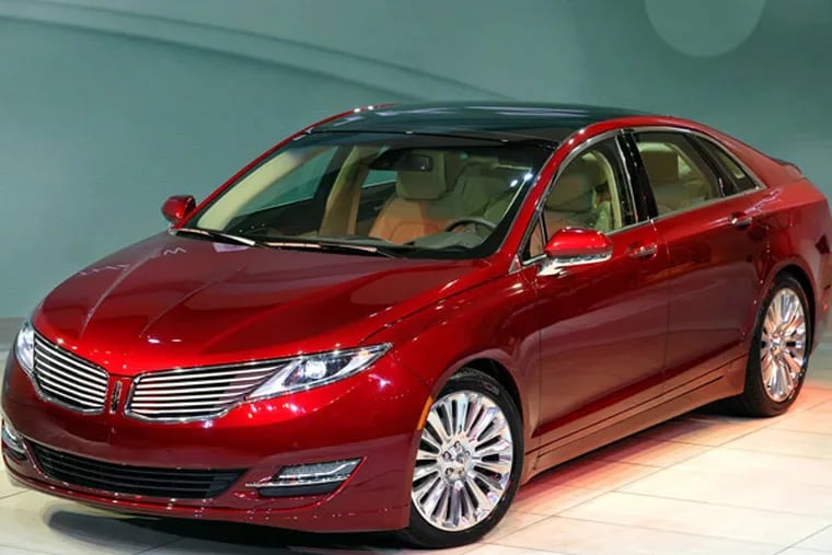 The 2014 Lincoln MKZ is available as a conventional four-cylinder sedan or as a hybrid for the same base price. (MCT)