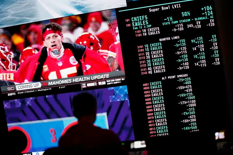 Betting odds for the Super Bowl are displayed on monitors at the Circa resort and casino sportsbook in Las Vegas on Feb. 3.