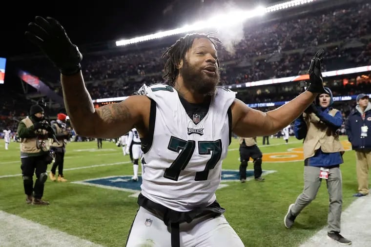 Michael Bennett flaps his arms after -- his wings? -- after the Eagles' win on Sunday at Soldier Field.