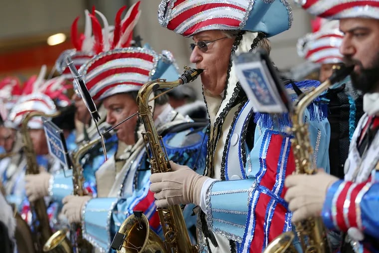 Ferko String Band members perform during the 2020 Mummers Parade. The 2022 edition of the event will be pushed back a day to Jan. 2 because of rain.