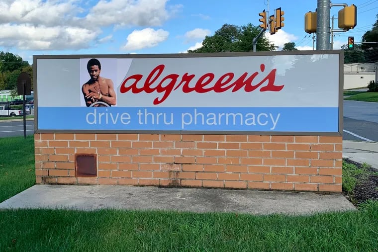 West Chester street artist Cassius King installed sticker art on top of a Walgreens in Bradford Plaza to read, "algreen's." The sticker was removed after four days.