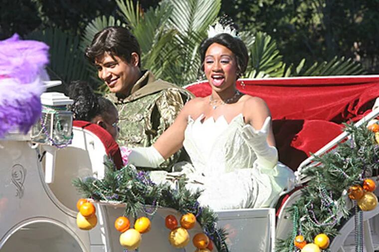 In this 2009 file photo, the princess of Disney's "Princess and the Frog" film rides in a coach during the annual Orlando Citrus Parade. (George Skene/Orlando Sentinel/MCT)