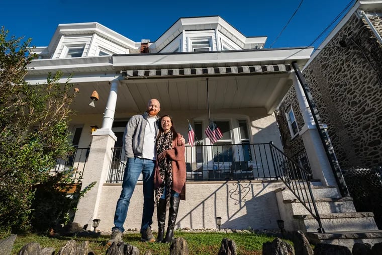 Newlyweds Kevin Hannon and Melissa McNichols in front of their new home in the Wissahickon neighborhood of Philadelphia. They set up a “home fund” on their wedding website, and the money helped the couple pay the up-front costs of buying their home.