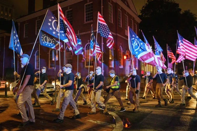 Members of Patriot Front, a white supremacist group, chanted "Reclaim America" and "Take America back" as they marched through Center City late Saturday into early Sunday morning.