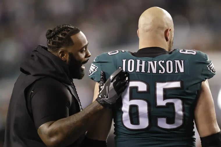 Eagles offensive tackle Jason Peters talk to teammate offensive tackle Lane Johnson in the NFC Championship game on Sunday, January 21, 2018 in Philadelphia.