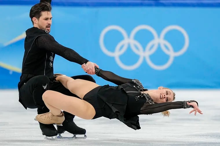 Madison Hubbell, right, and Zachary Donohue, of the United States, skate their Janet Jackson rhythm dance in the team event at the 2022 Winter Olympics.