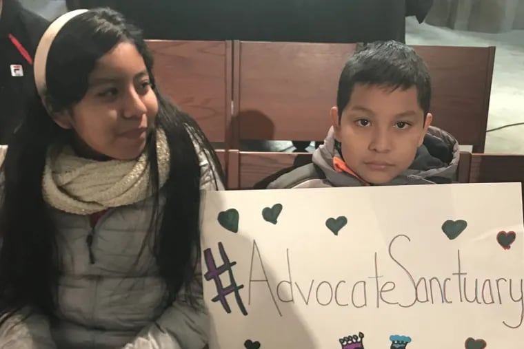 Yoselin and Edwin, two members of the Hernandez family in sanctuary at Church of the Advocate.