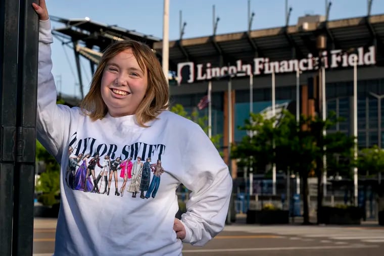 Taylor Swift fan Maggie Mullooly outside Lincoln Financial Field, where Swift will play three shows. Mullooly does not have tickets but hopes to find some last minute for $500 or less.
