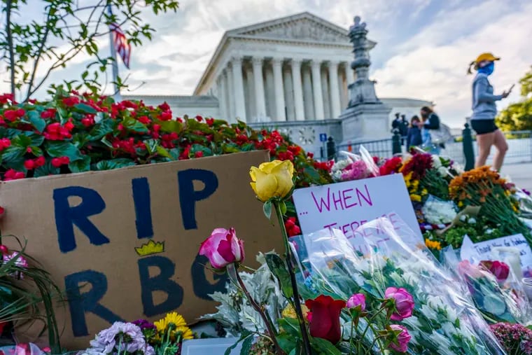 People gather Saturday at the Supreme Court, the morning after the death of Justice Ruth Bader Ginsburg.