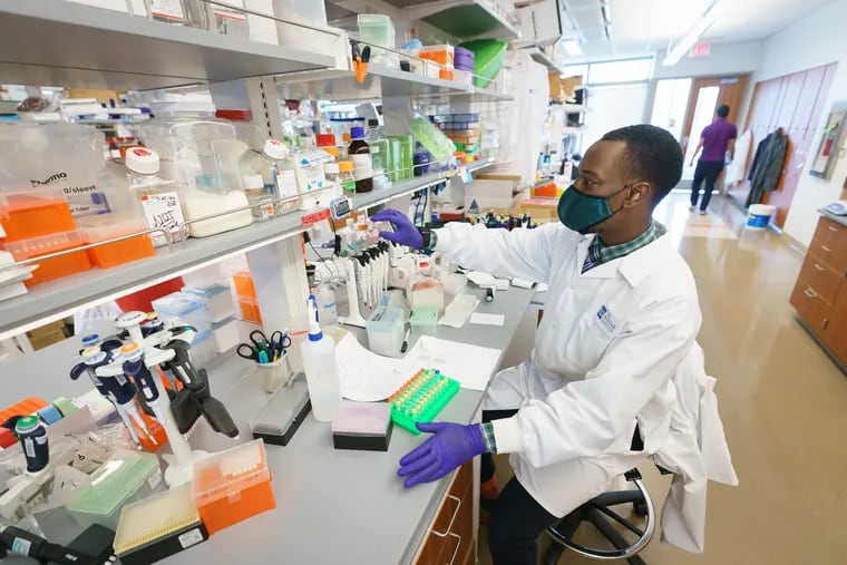 Yaya Dia, a graduate of Community College of Philadelphia, is a research technician at the Wistar Institute, where he helps study a possible COVID vaccine.