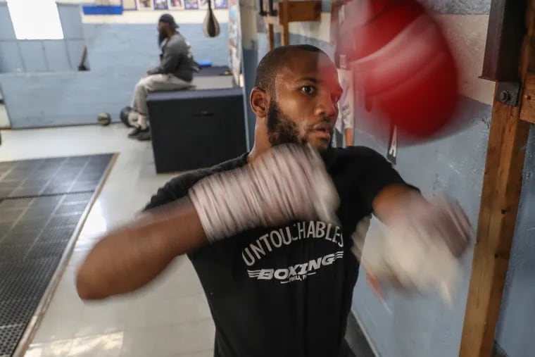 Julian Williams, who is the light-middleweight champion, works the speed bag at the Shuler Memorial Boxing Gym.