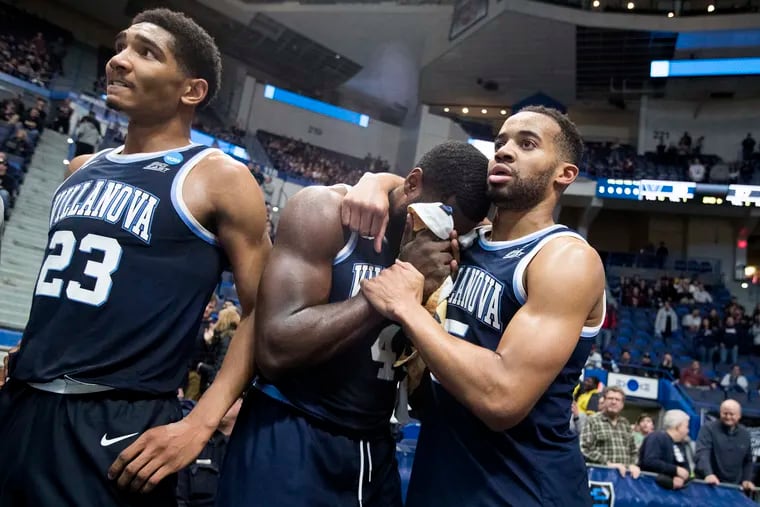 L-R; Jermaine Samuels, Eric Paschall, and Phil Booth of Villanova in the final moments of their loss to Purdue in the 2nd round NCAA Tournament game at the XL Center in Hartford, CT on March 23, 2019.