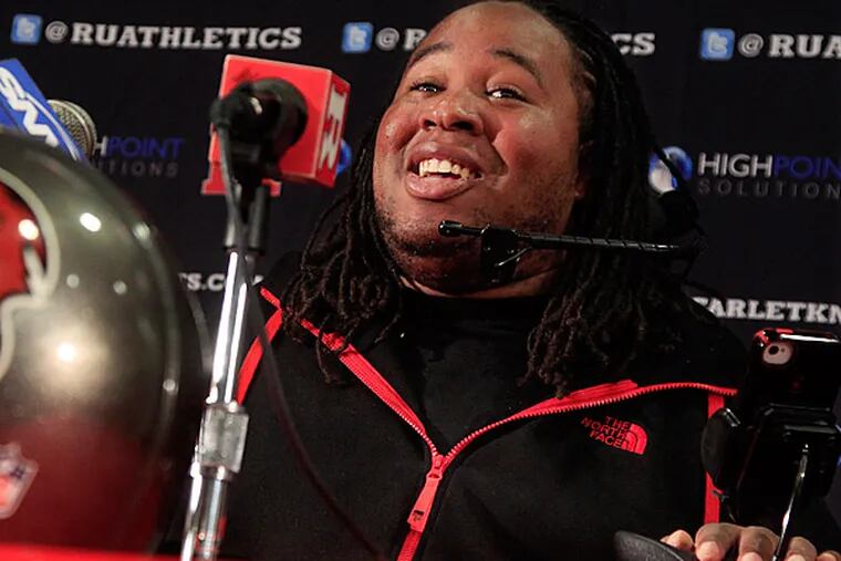 Rutgers retired Eric LeGrand's No. 52. LeGrand broke two vertebrae and suffered a serious spinal cord injury on a kickoff return against Army during the 2010 season. (AP Photo/Mel Evans)