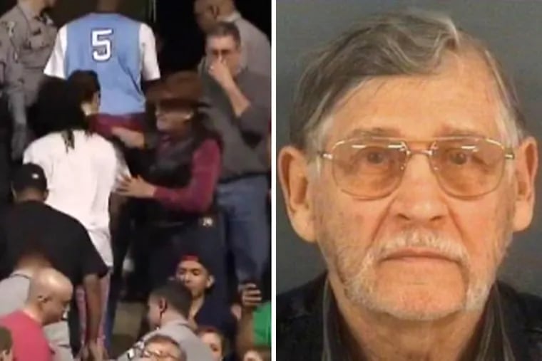 John McGraw (right) was arrested on an assault charge after striking a black protester in the face during a Donald Trump rally in North Carolina.