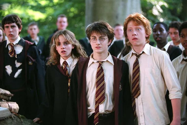The Harry Potter crew (from left): Emma Watson, Daniel Radcliffe, and Rupert Grint. A new collection contains 45 hours of extras.