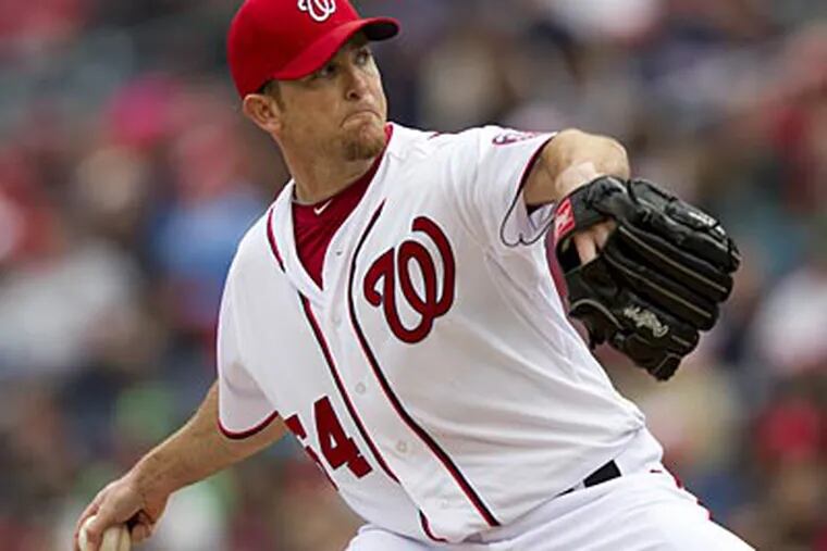 Brad Lidge recorded a 9.64 ERA in 11 appearances before the Nationals designated him for assignment. (Evan Vucci/AP)