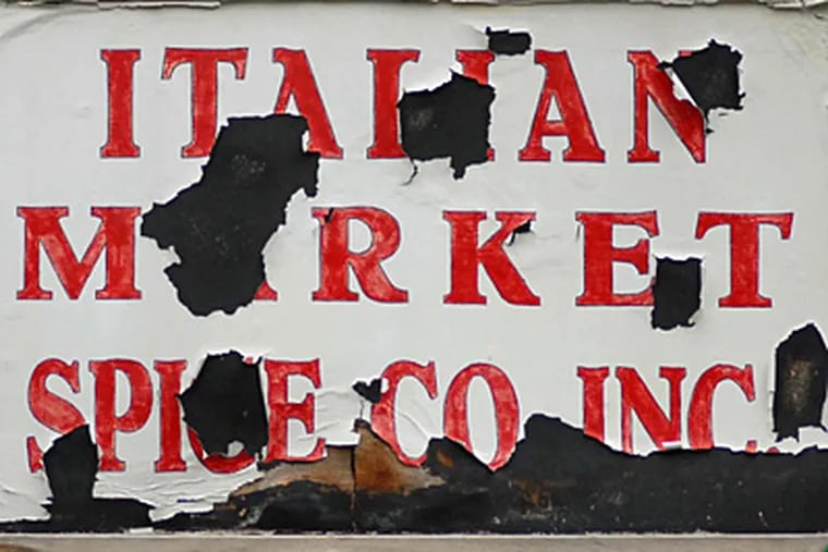 Old sign for Spice Co. on S. 9th St. in the Italian Market.  Once again the Italian Market is vowing to get its act together and clean up its image. ( Peter Tobia / Staff Photographer )