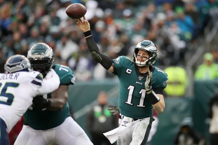 Eagles quarterback Carson Wentz throws against the Seahawks. Wentz had four turnovers in the defeat as he struggled for the second straight week.