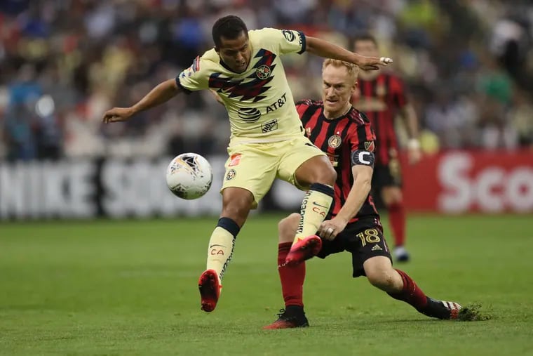Giovani Dos Santos (left) playing for Club América in the Concacaf Champions League against Atlanta United this week.