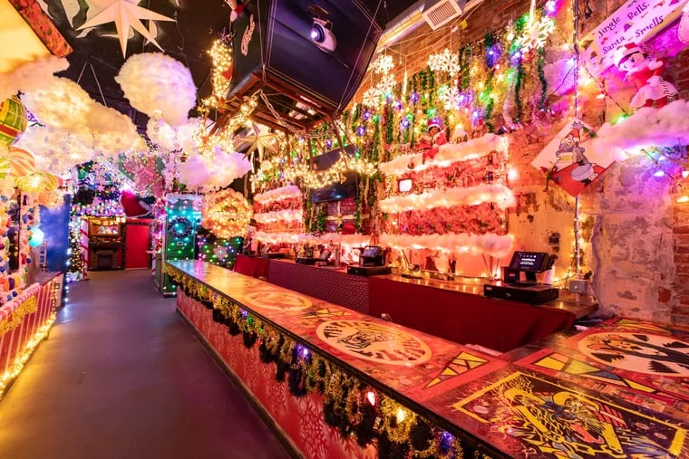 Bask under the neon glow of familiar Christmas heroes and antiheroes at Tinsel.