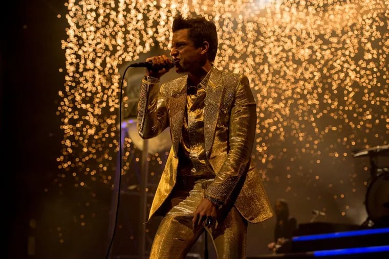 Brandon Flowers of The Killers turned the Wells Fargo Center into the world's largest karaoke bar.
