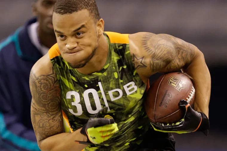 Alabama defensive back Dee Milliner runs a drill at the NFL football scouting combine in Indianapolis, Tuesday, Feb. 26, 2013. (Michael Conroy/AP file)