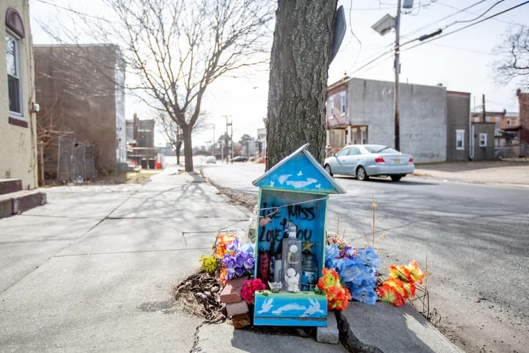 A roadside memorial in front of an abandoned property at 340 10th St. in North Camden.  City Council has proposed a measure to limit the amount of time makeshift memorials can be displayed in public to 15 days.