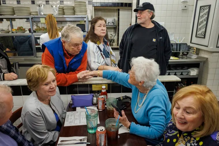 Former State Sen. Vincent Fumo shakes hands with former District Attorney Lynne Abraham at the Election Day lunch at the Famous 4th Street Deli.