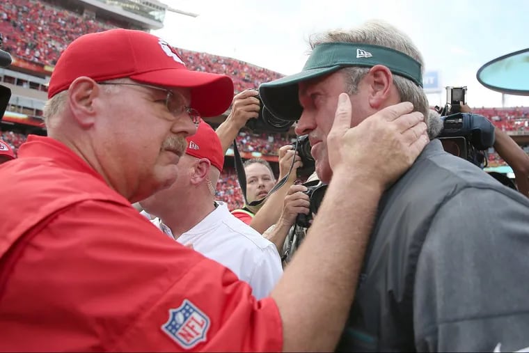 Cheifs coach Andy Reid, left, greets Eagles coach Doug Pederson after the Birds lost to their former coach in September.