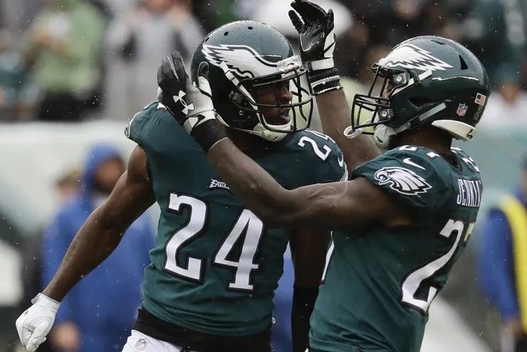 Eagles defensive back Corey Graham and defensive back Malcolm Jenkins celebrate a stop against the Indianapolis Colts on Sunday, September 23, 2018 in Philadelphia. YONG KIM / Staff Photographer