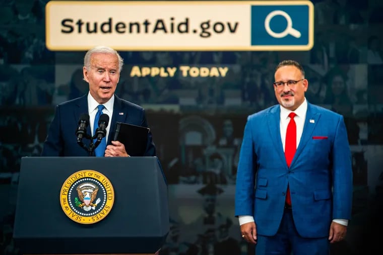 President Biden discusses student loan relief alongside Education Secretary Miguel Cardona in 2022.