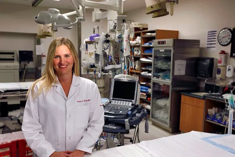 Trish Henwood, assistant professor of emergency medicine at the Hospital of the University of Pennsylvania, will travel to Liberia to work with the International Medicine Corps treating Ebola patients. ( MICHAEL S. WIRTZ / Staff Photographer )