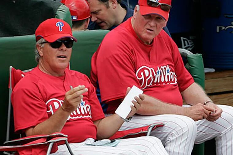 Pete Mackanin (left) has been Charlie Manuel's bench coach for three seasons. (Eric Mencher/Staff file photo)