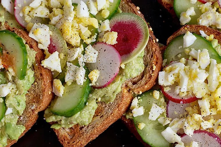 Avocado toast with egg, cucumber, radish is a healthy option. (DEB LINDSEY / Washington Post)