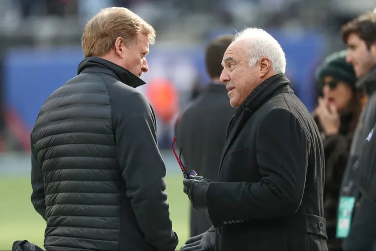 Eagles owner Jeffrey Lurie, right, shared a moment with NFL Commisioner Roger Goodell, left, on Sunday, prior to the Eagles-Giants game at Met Life Stadium.