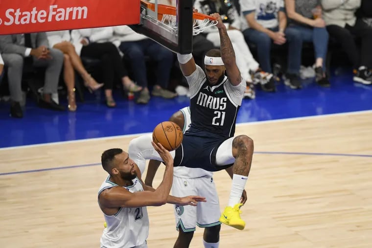 Daniel Gafford #21 of the Dallas Mavericks dunks the ball during the third quarter against the Minnesota Timberwolves in Game One of the Western Conference Finals at Target Center on May 22, 2024 in Minneapolis, Minnesota. (Photo by Stephen Maturen/Getty Images)