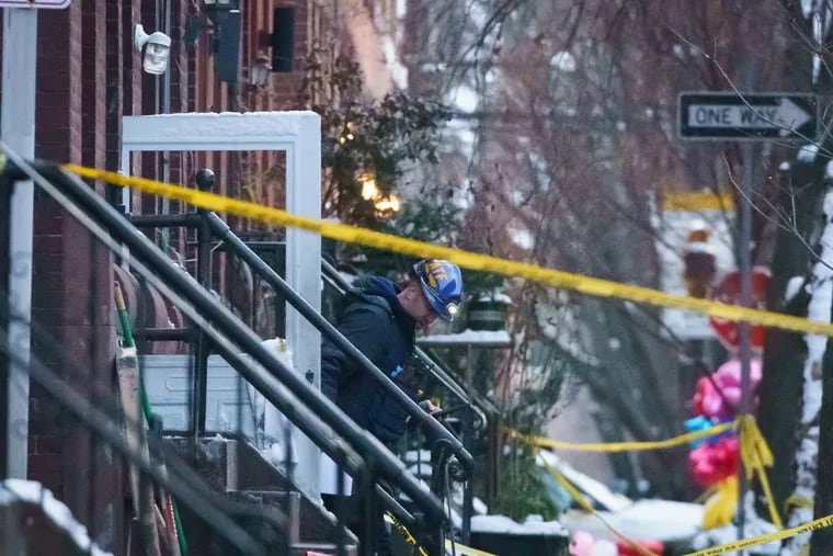 The investigation continues at a row house on 23rd Street between Poplar and Parrish Streets. A fire that began before sunrise on Wednesday killed 12 people -  9 children and 3 adults.