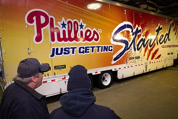 Marty Garland (left) is the driver of the Phillies spring training tractor trailer that will be heading south to Florida with team supplies. (Alejandro A. Alvarez/Staff Photographer)